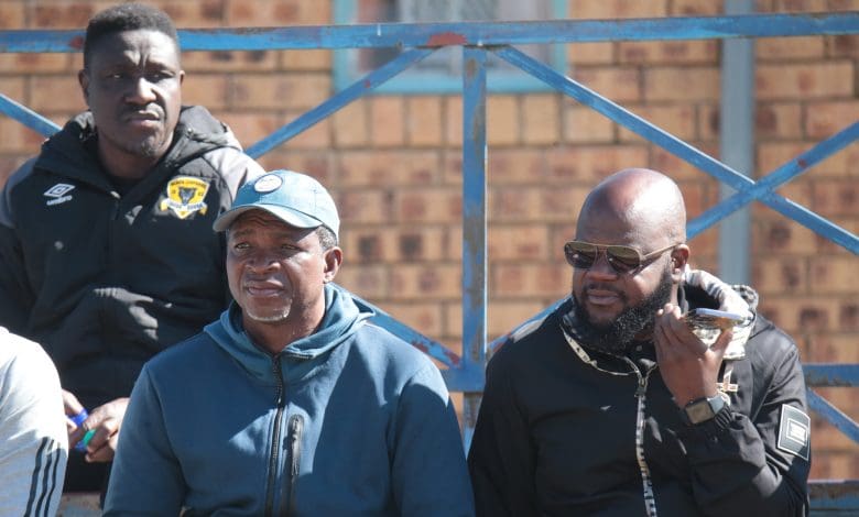 Black Leopards coach Maxwell Konadu sitting with Chief Thidiela