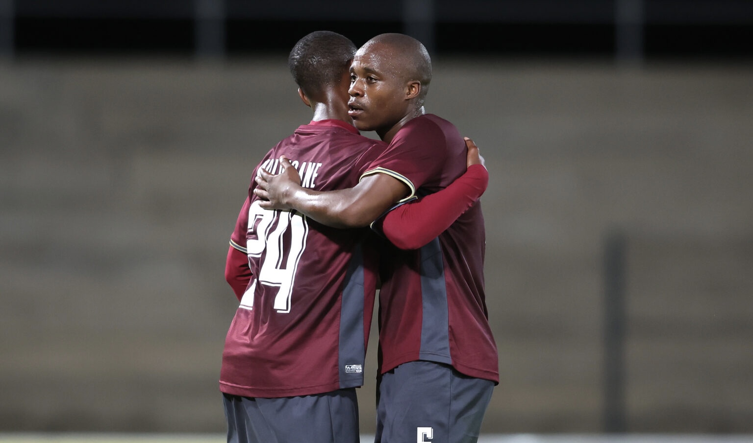 Brendon Thabo Moloisane of Stellenbosch FC and Darrel Matsheke hugging during the Stellenbosch match