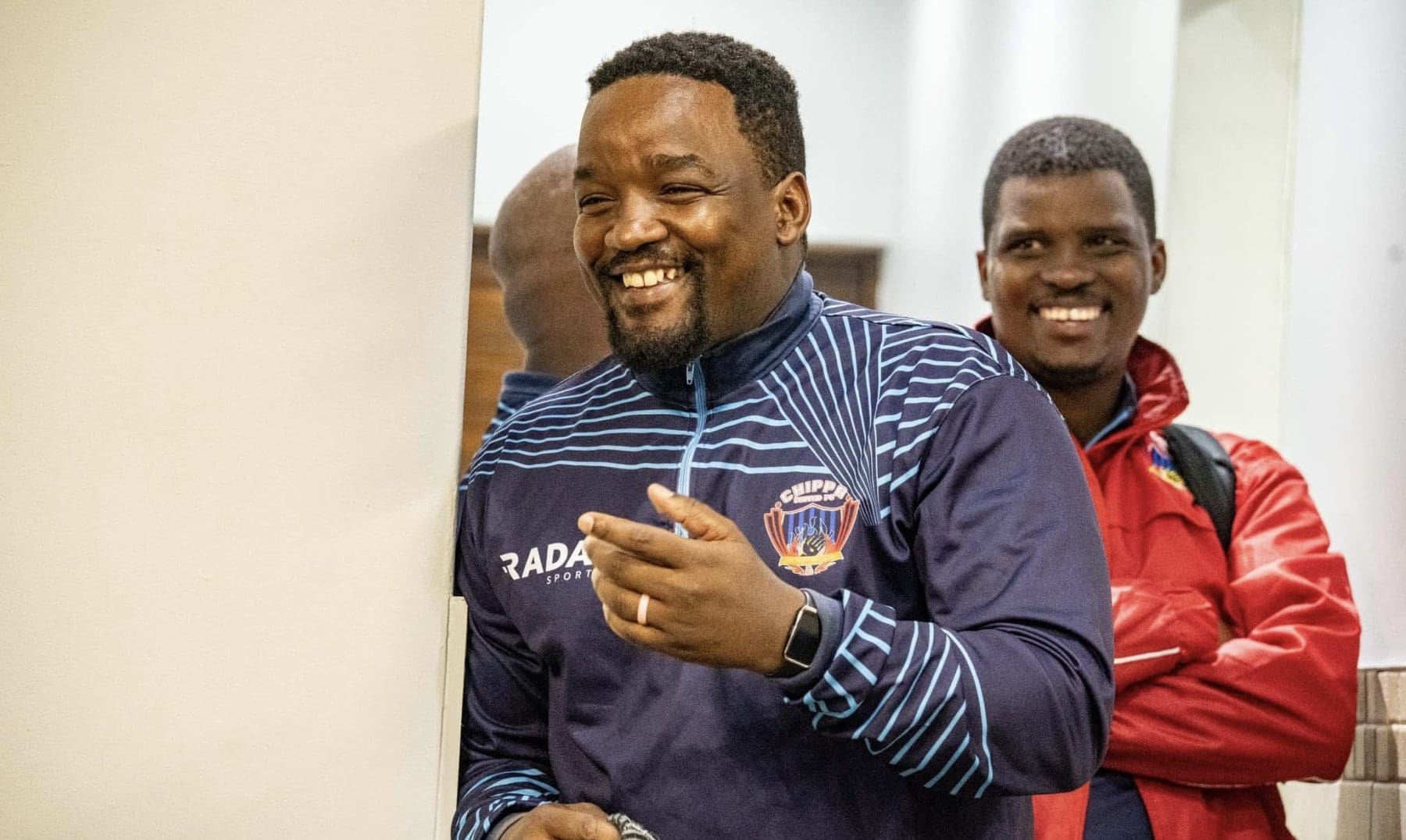 Chippa United coach Thabo September laughing