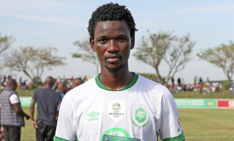 Former AmaZulu FC defender Veluyeke Zulu holding Man of the Match award