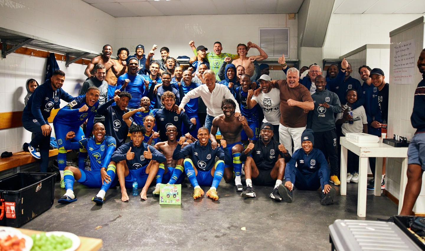 Cape Town City FC chairman John Comitis and his players in the dressing room after a win