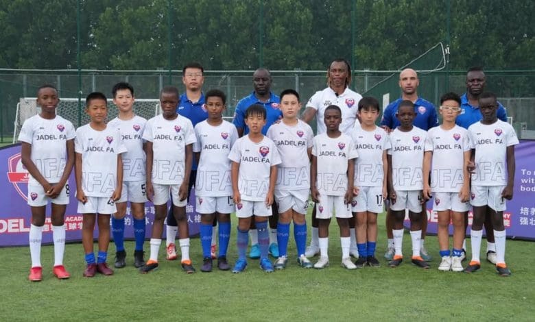 Former Orlando Pirates centre-forward Gilbert Mushangazhike with Jadel Football Academy players and coaches