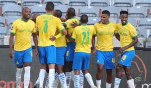 Mamelodi Sundowns players celebrating after scoring a goal against Orlando Pirates at Orlando Stadium