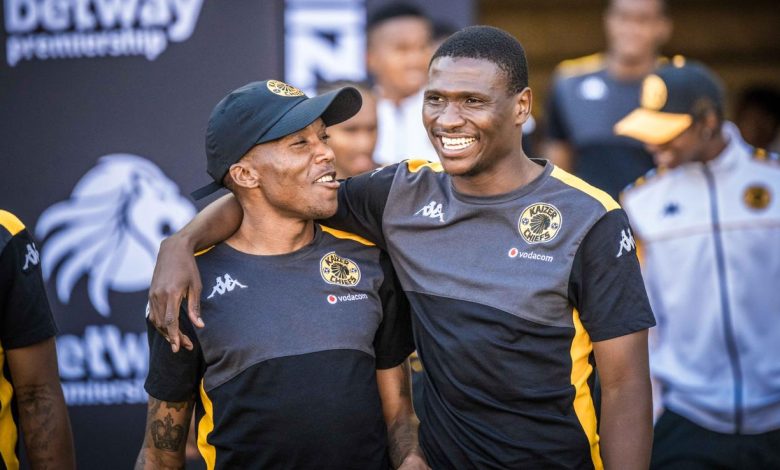 Thatayaone Ditlhokwe and Pule Mmodi having a chat before a Kaizer Chiefs game