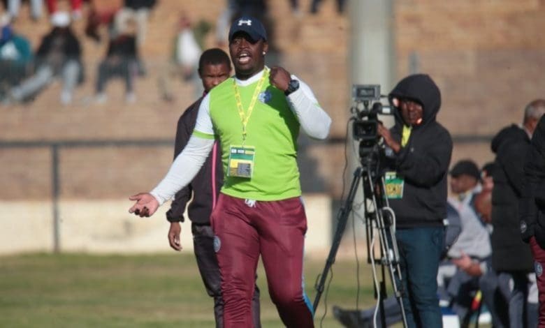 Coach Tshepo Motsoeneng on the touchline