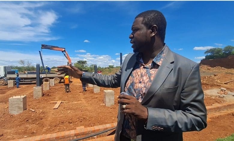 Khama Billiat's former boss Walter Magaya during a tour of Chahwanda stadium.