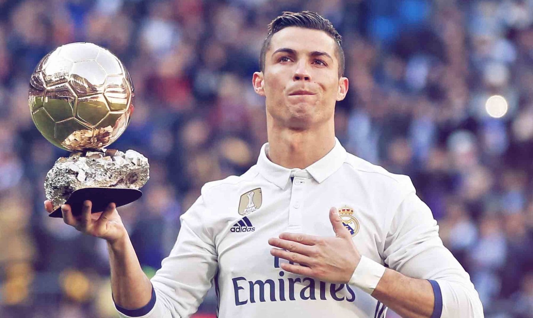 Former Real Madrid star Cristiano Ronaldo holding a Ballon d’Or 