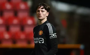 Elyh Harrison of Manchester United in action