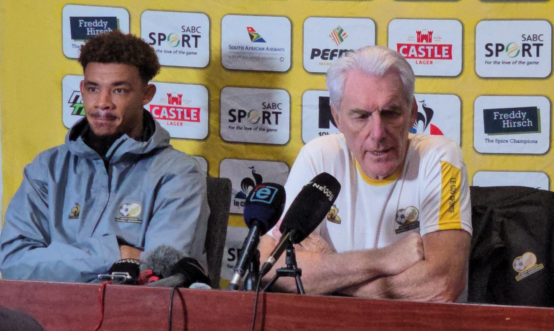 Bafana Bafana captain Ronwen Williams and coach Hugo Broos during a media briefing at Peter Mokaba Stadium. 