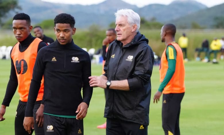 Bafana Bafana coach Hugo Broos giving instructions to Jayden Adams at training.