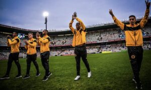 Kaizer Chiefs players doing the pitch inspection