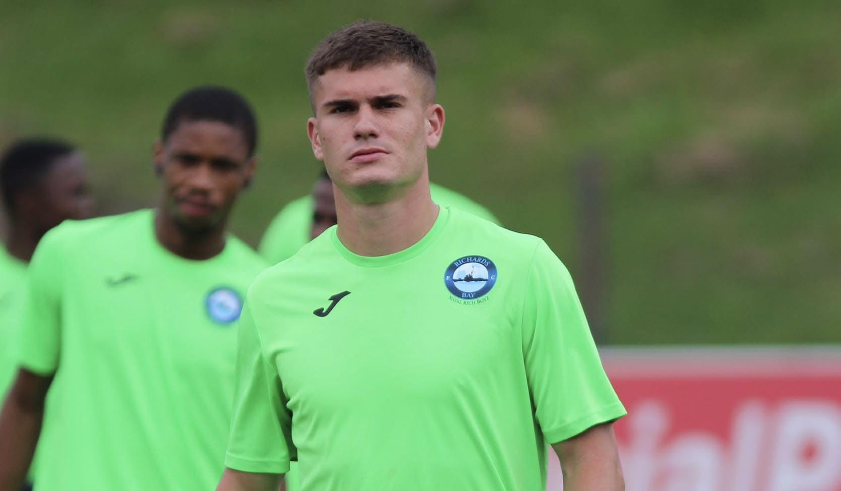 Richards Bay FC defender Keegan Allan during the pitch inspection 