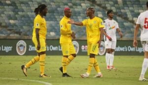 Knowledge Musona with Khama Billiat and Jordan Zemura during their match against Benin