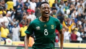 Orlando Pirates star Patrick Maswanganyi in celebratory mood in Bafana Bafana colours