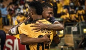 Rushwin Dortley and Inacio Miguel of Kaizer Chiefs hugging