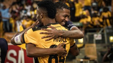 Rushwin Dortley and Inacio Miguel of Kaizer Chiefs hugging