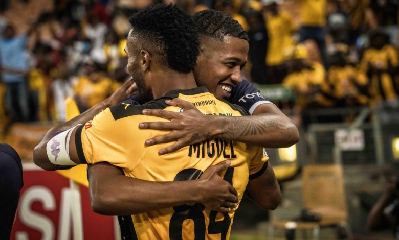 Rushwin Dortley and Inacio Miguel of Kaizer Chiefs hugging