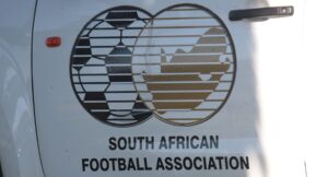A SAFA white vehicle with an official logo.