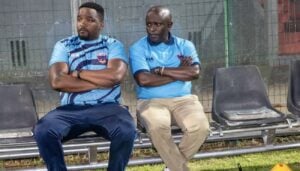 Kwanele Kopo and Thabo September sitting on the Chippa United bench