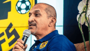 Coach Farouk Khan addressing the media