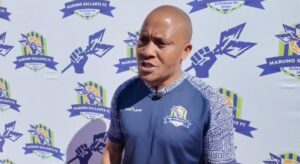 Dino Ndlovu addressing the media team