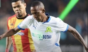 Mamelodi Sundowns’ Divine Lunga and Esperance’s Yan Sasse during the CAF Champions League match