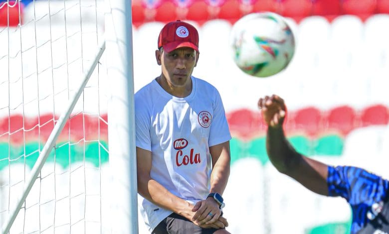 Fadlu Davids looking at his goalkeeper during a training session.