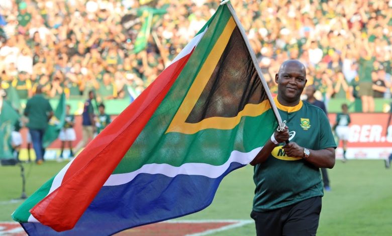 Former Bafana Bafana coach Pitso Mosimane with the SA flag