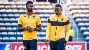 Inacio Miguel and Thabo Cele of Kaizer Chiefs walking
