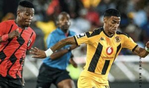 TS Galaxy midfielder Nhlanhla Mgaga challenging Kaizer Chiefs defender Dillan Solomons on the ball