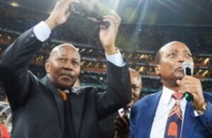 Patrice Motsepe and Kaizer Motaung sharing a moment after a Kaizer Chiefs game