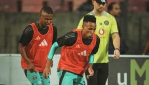 Orlando Pirates youngsters Mohau Nkota and Relebohile Mofokeng warming up