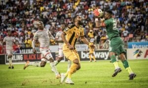 Chippa United goalkeeper Stanley Nwabali and Kaizer Chiefs striker Tashreeq Morris during the action