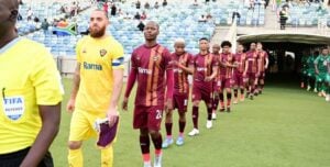 Stellenbosch FC players heading into the pitch