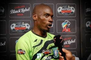 Elvis Chipezeze collecting a man of the match award.