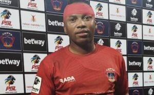Andile Jali with a man of the match award.