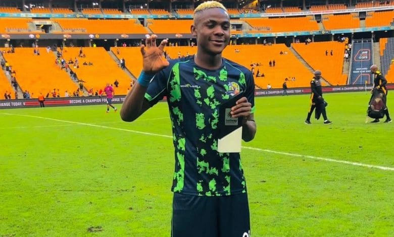 Daniel Msendami after receiving a Man of the Match Award