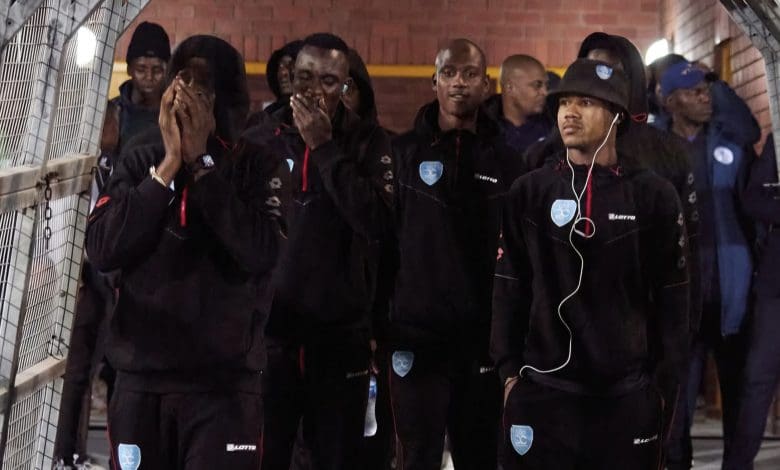Durban City players entering the pitch