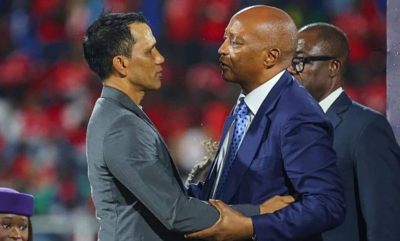 Fadlu Davids with CAF President Patrice Motsepe during the CAF Confederations Cup medal ceremony