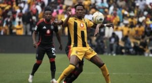 Kaizer Chiefs attacker shielding in the Soweto Derby against Orlando Pirates