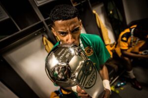 Kaizer Chiefs wing back Dillan Solomons with the Nedbank Cup.