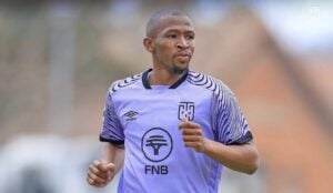 Kamohelo Mokotjo wearing the purple Cape Town City kit.