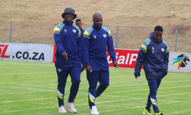 Kruger United players pitch inspection before a game in the PSL