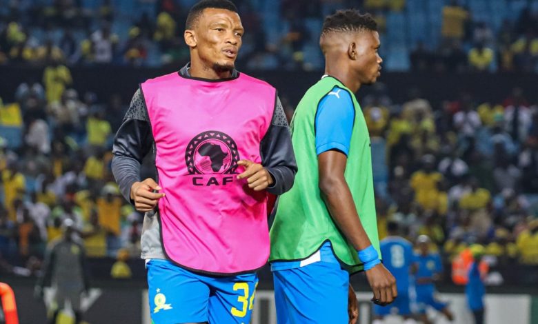 Mamelodi Sundowns defender Mothobi Mvala warm up