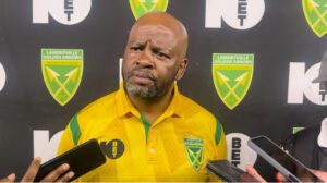 Golden Arrows coach Manqoba Mngqithi speaking with journalists