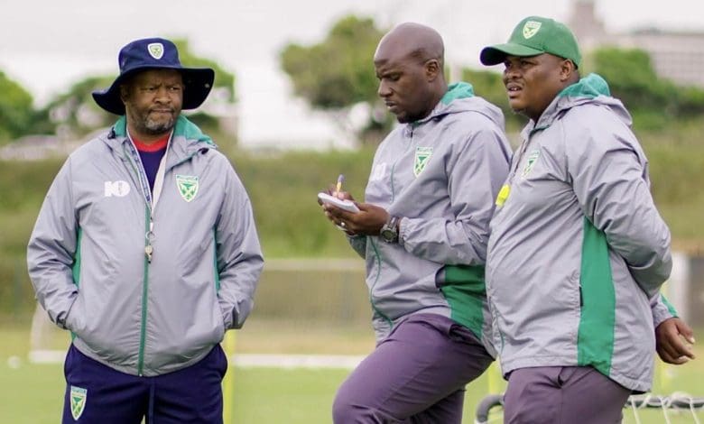 Arrows coaches Manqoba Mngqithi, Musa Bilankulu and Kagiso Dikgacoi standing together in training