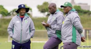 Arrows coaches Manqoba Mngqithi, Musa Bilankulu and Kagiso Dikgacoi standing together in training