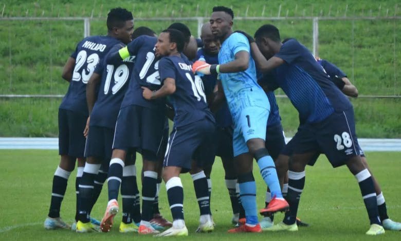 Orbit College players during a team talk before a match.