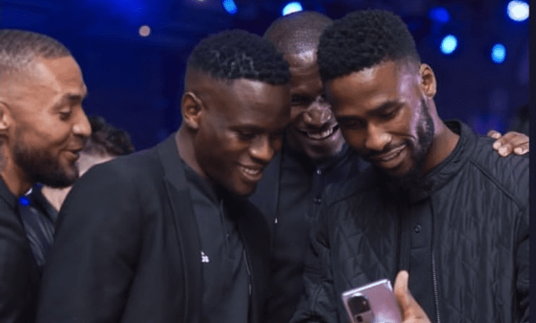 Innocent Maela with his Orlando Pirates teammates Miguel Timm and Sipho Chaine