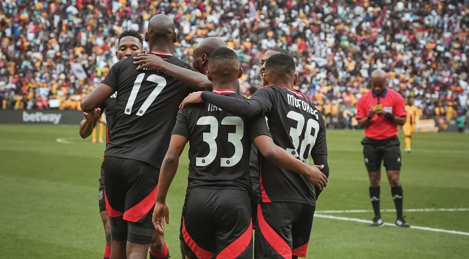 Orlando Pirates players celebrating a goal in the Soweto Derby